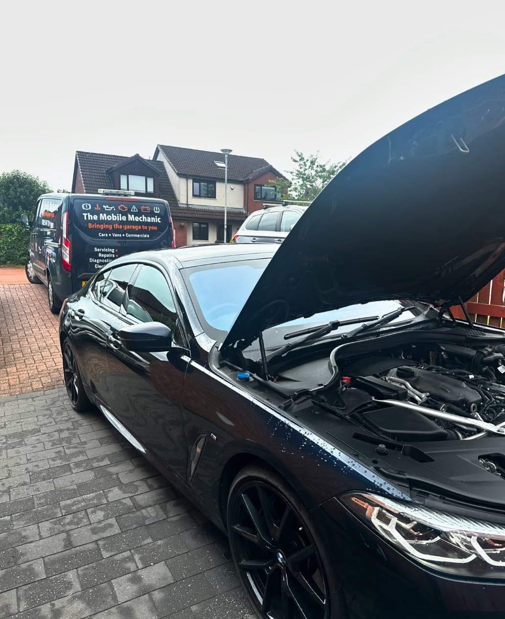 Mechanic working on a car